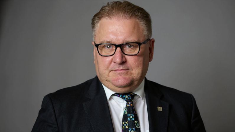 A firefighter works at the site of a Russian strike in Kyiv, on April 16.