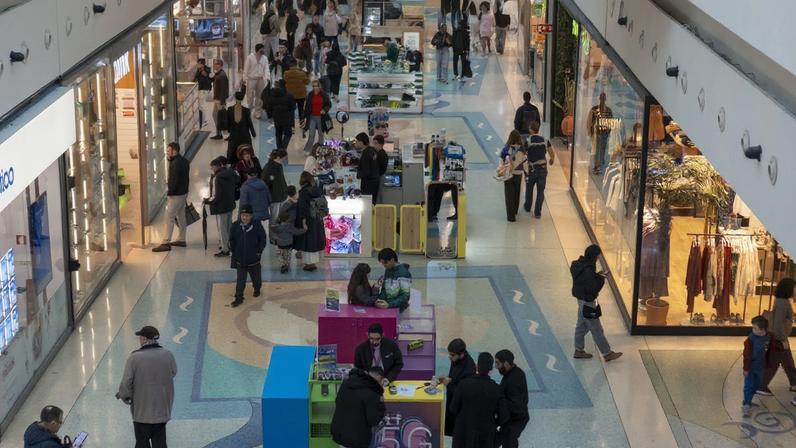 A general view shows people shopping inside a shopping center in Lisbon, Portugal, on February 1, 2026. Retail activity reflects consumer behavior trends within Portugal's urban economy and the broader European market.
