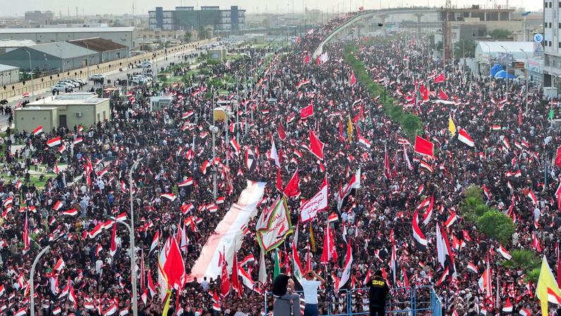 A drone view of supporters of Iraqi Shi'ite cleric Muqtada al-Sadr taking part in a peaceful protest against U.S. and Israeli actions in the region, amid the U.S.-Israeli conflict with Iran, in Basra, Iraq, April 4, 2026. REUTERS/Mohammed Aty