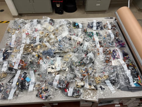 Seized Lego sets displayed on a table.