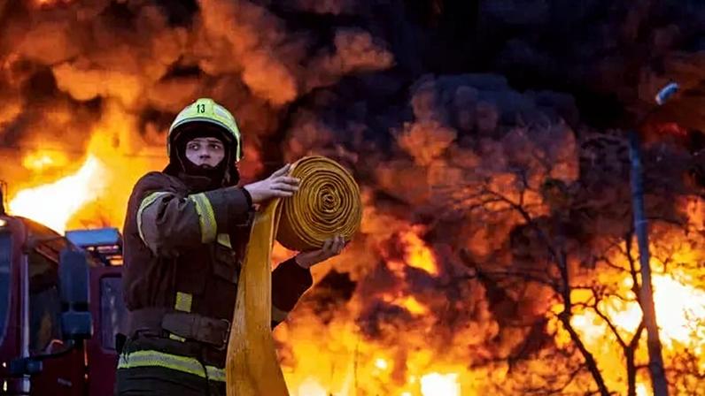 A firefighter worked to extinguish a blaze after a Russian strike in Kyiv, Ukraine, this month.