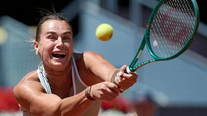 Aryna Sabalenka plays a backhand on her way to beating Naomi Osaka in the Madrid Open on Monday.