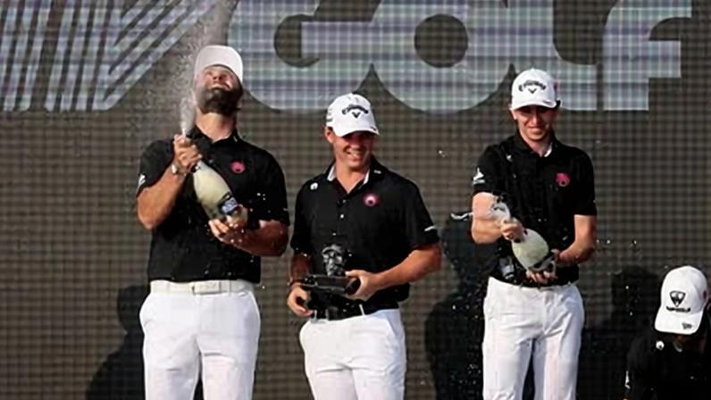 Tyrrell Hatton, Caleb Surratt, Tom McKibbin and Jon Rahm celebrate with the team trophy after winning the LIV Golf event at Mexico City this month.