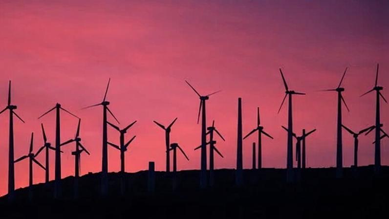 Electric energy generating wind turbines are seen on a wind farm in the San Gorgonio Pass area on Earth Day, 22 April 2016, near Palm Springs, California.