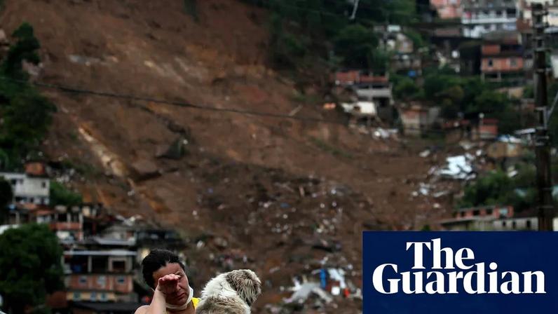 Shocked residents in the aftermath of the devastating mudslide at Morro da Oficina, after heavy rainfall in Petrópolis, Brazil, in February 2022.