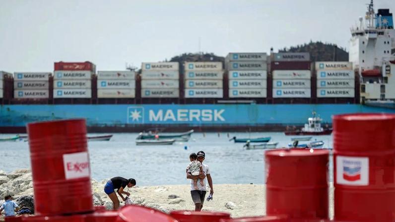 A ‘make polluters pay’ protest demanding oil companies pay for the energy transition, on the coast during the nearby conference in Santa Marta on Monday.