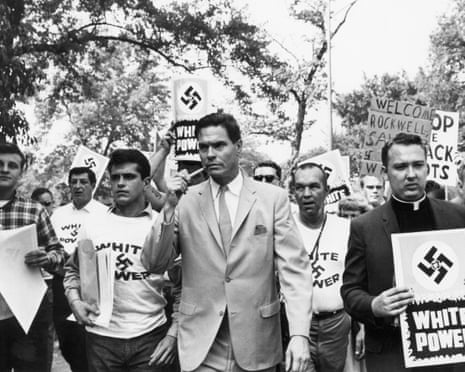 George Lincoln Rockwell, American Nazi party founder, leading a group of his supporters in 1967.