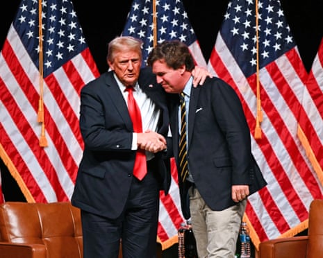 Trump with Tucker Carlson at the Desert Diamond Arena in Glendale, Arizona, in October 2024.