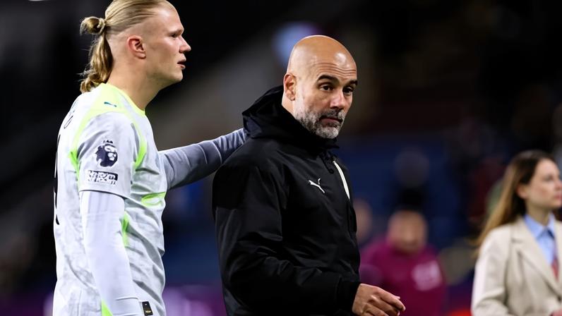 Pep Guardiola with Manchester City’s match winner, Erling Haaland at Turf Moor.