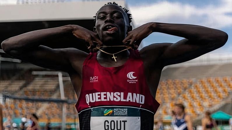 Gout Gout celebrates after qualifying fastest with a time of 10.19sec in the under-20 100m heats at the Australian athletics junior championships in Brisbane.