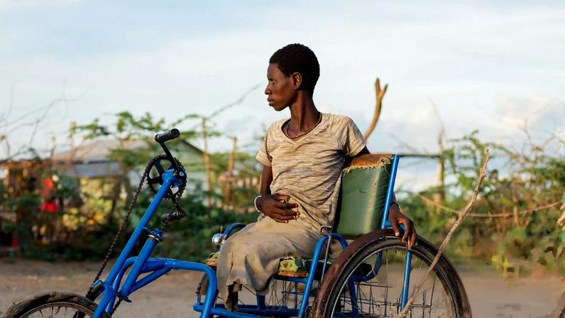Ng’ikalei Loito outside her home. Photograph: Esther Sweeney/The Guardian