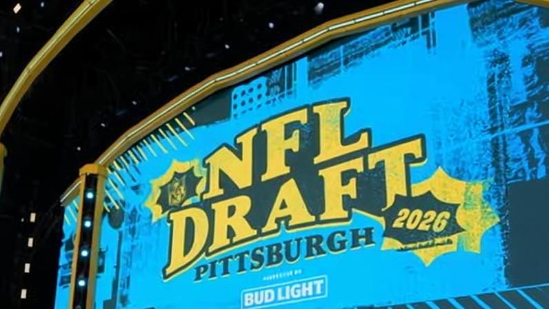 People rehearse on a stage ahead of Thursday night's NFL draft in Pittsburgh.