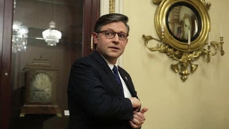 Republican Mike Johnson, the US House speaker, arrives at a ceremonial swearing-in for representative Clay Fuller at the US Capitol on 14 April 2026 in Washington DC.