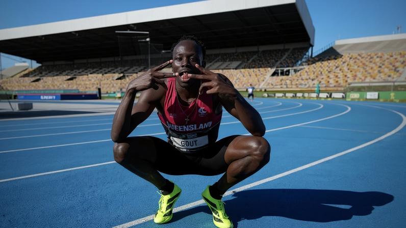 Gout Gout celebrates victory in the under-20 100m after finishing in 10.21 seconds at the 2026 Australian Athletics Junior Championships in Brisbane.
