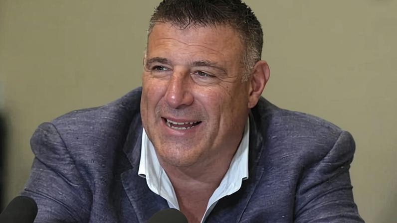 New England Patriots head coach Mike Vrabel speaks to reporters at the annual NFL meetings in Phoenix last month.