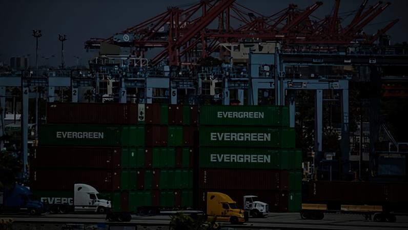 Cargo containers sit stacked at the Port of Los Angeles.