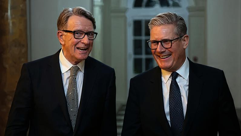 Lord Mandelson smiles alongside Prime Minister Sir Keir Starmer in February 2025.