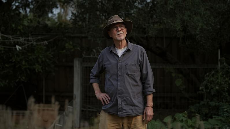 ‘So I was alone but not lonely, for I had my princess’: Andrew Herrick in his Melbourne backyard.