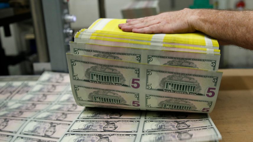 Sheets of former U.S. President Abraham Lincoln on the five-dollar bill currency are fanned out at the Bureau of Engraving and Printing in Washington March 26, 2015
