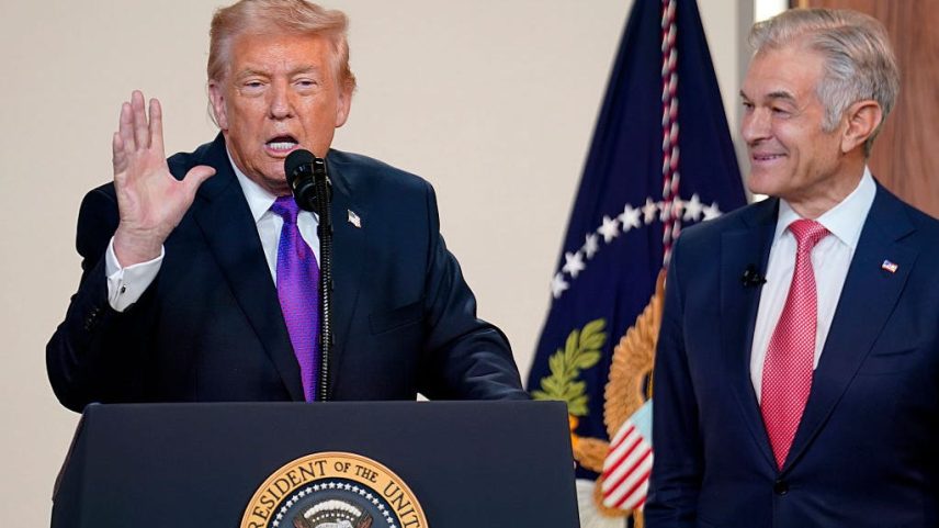 U.S. President Donald Trump speaks as Administrator for the Centers for Medicare & Medicaid Services Mehmet Oz looks on during an event on drug pricing in the South Court Auditorium on the White House campus on February 5, 2026 in Washington, DC. Oz recently told Trump Jr. in a podcast apperance that his dad often drinks diet soda, which he claimed could kill cancer cells.