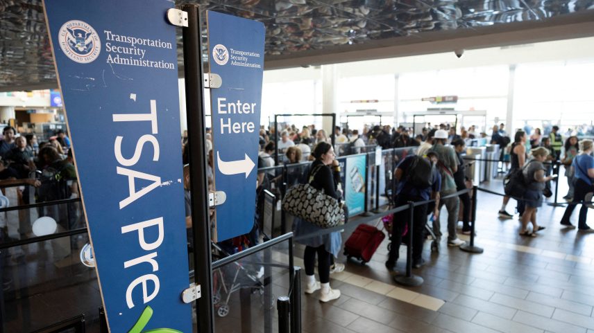 ICE agents check IDs at the TSA security checkpoint at Atlanta Hartsfield-Jackson International Airport on March 27, 2026 in Atlanta, Ga. The travel disruptions continue as hundreds of TSA agents quit or work without pay during a partial government shutdown. U.S. President Donald Trump deployed ICE agents to U.S. airports on Monday, with border czar Tom Homan in charge of the effort.