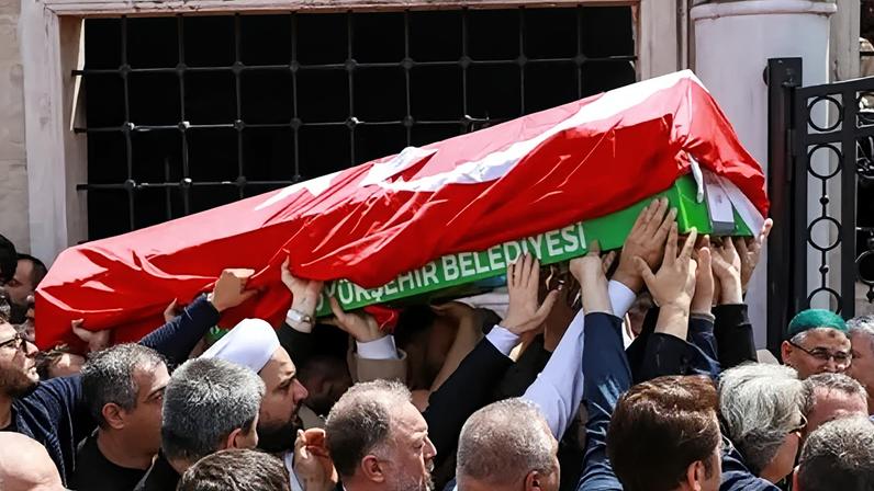 The coffin of a victim is carried during the funeral prayers in Kahramanmaras