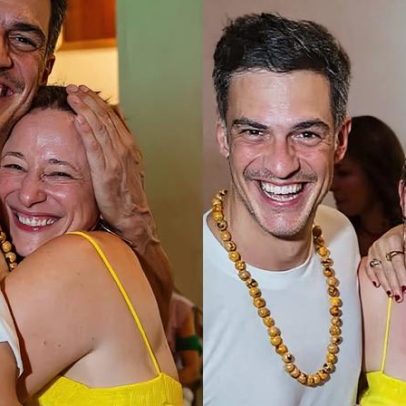 Mateus Solano e Paula Braun posam abraçados no aniversário da atriz