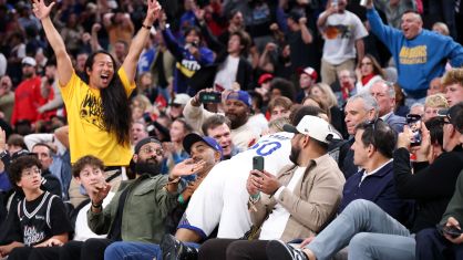 INGLEWOOD, CA - APRIL 15: Golden State Warriors fans cheer after guard Stephen Curry (30) falls into the seats after being fouled on a three-point shot during the fourth quarter of an NBA play-in-tournament against the LA Clippers at the Intuit Dome in Inglewood Wednesday, April 15, 2026. (Allen J. Schaben / Los Angeles Times via Getty Images)