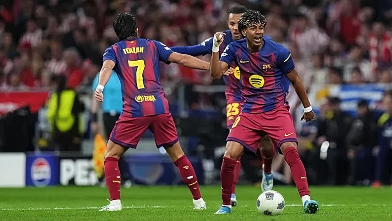 MADRID, SPAIN - APRIL 14: Lamine Yamal of FC Barcelona celebrates scoring his team's first goal during the UEFA Champions League 2025/26 Quarter-Final Second Leg match between Club Atlético de Madrid and FC Barcelona at Riyadh Air Metropolitano on April 14, 2026 in Madrid, Spain. (Photo by Angel Martinez/Getty Images)