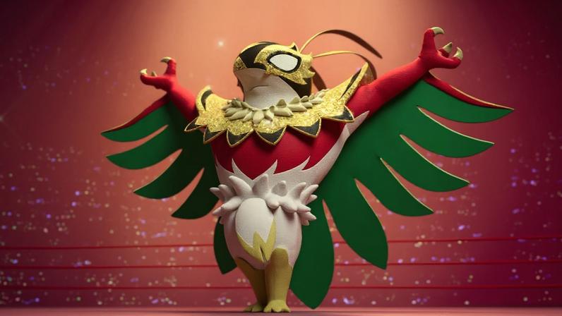 Mega Hawlucha poses in a ring.