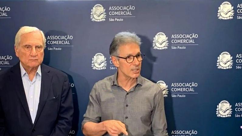 Apesar da crítica, Zema reconheceu aproximação entre as siglas em alguns Estados; na imagem, Alfredo Cotait Neto (esq.) e Romeu Zema (dir.)