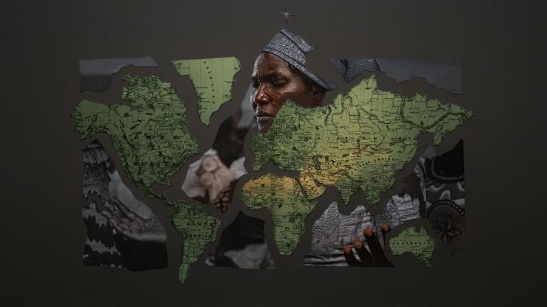 A world map and a black congregation.