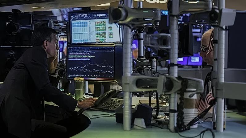 Operadores na bolsa de Nova York em 2 de abril de 2026