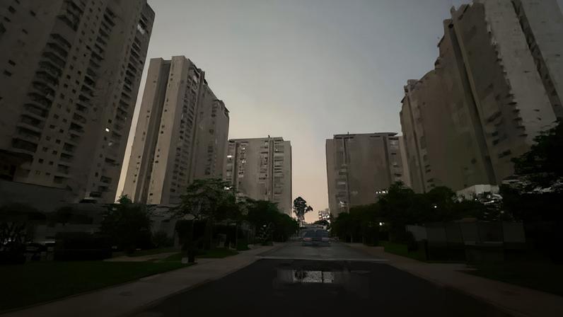 Foto registra São Paulo no escuro após chuva