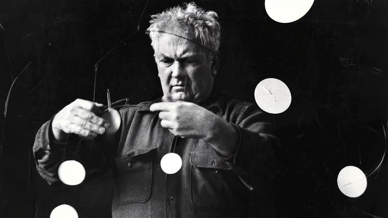 Alexander Calder with Snow Flurry I (1948) in a 1952 photograph by Gordon Parks