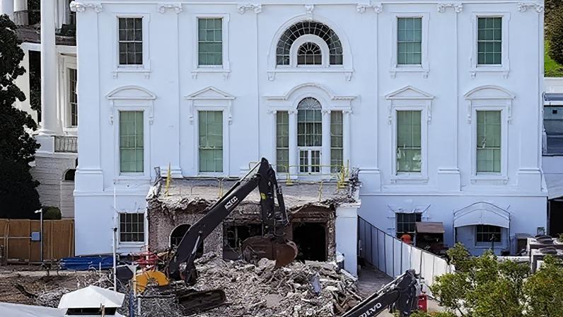 Getty Images The White House with a wrecker machine out front, on a pile of rubble