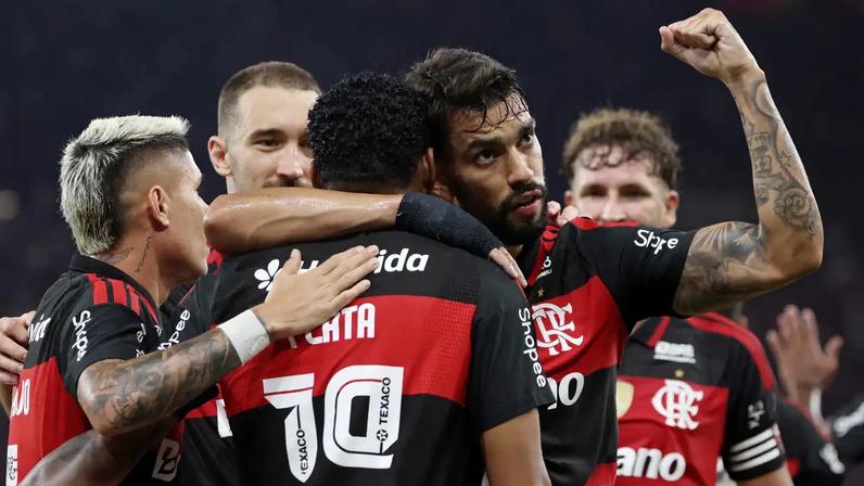 Soccer Football - Brasileiro Championship - Flamengo v Santos - Estadio Maracana, Rio de Janeiro, Brazil - April 5, 2026 Flamengo's Lucas Paqueta celebrates scoring their third goal with teammates REUTERS/Sergio Moraes
