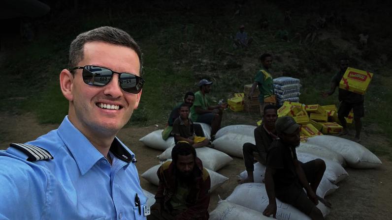 Johnny Reeves, a JAARS Pilot in Papua New Guinea, bringing in supplies.