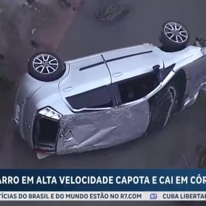 Carro em alta velocidade capota e cai em córrego na zona leste de SP