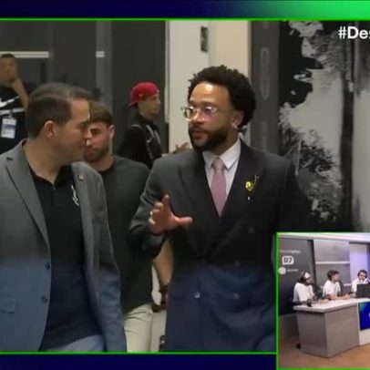 Memphis chama atenção na Neo Química Arena com estilo empresário