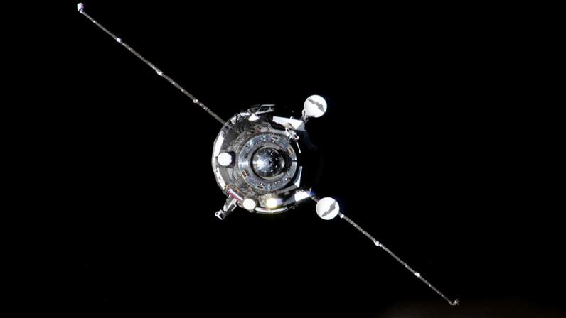 The Progress 93 resupply ship from Roscosmos, carrying about three tons of food, fuel, and supplies for the Expedition 73 crew, is pictured automatically approaching the International Space Station before docking to the Zvezda service module's rear port.