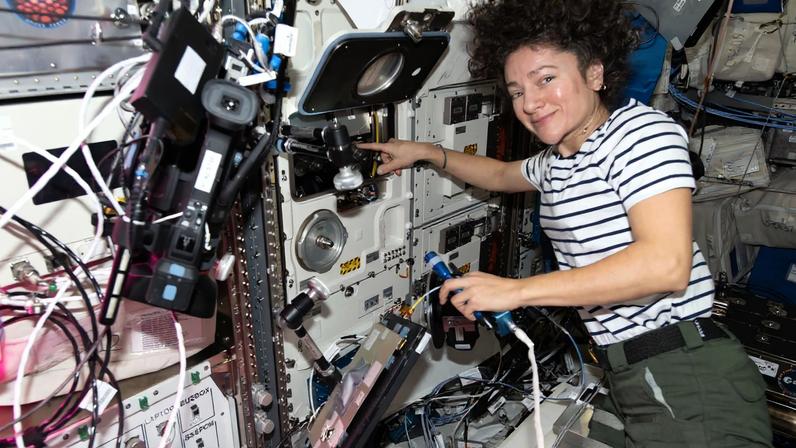 NASA astronaut and Expedition 74 flight engineer Jessica Meir works inside the International Space Station’s Columbus laboratory module swapping scientific hardware inside the BioLab research incubator. Meir was supporting the Lux in Space investigation that observes how DNA damaged by space radiation repairs itself.