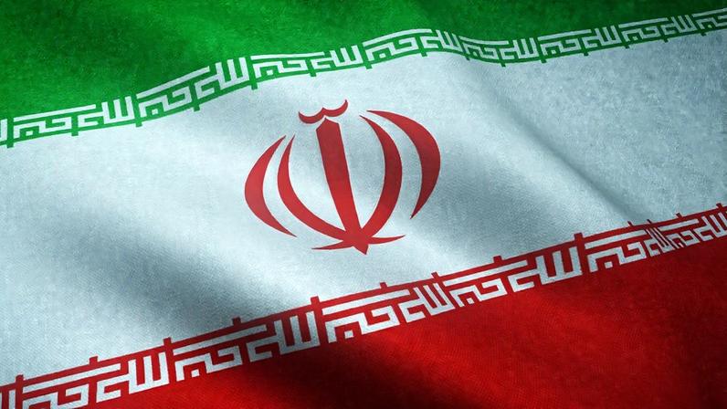 A closeup shot of the waving flag of Iran with interesting textures