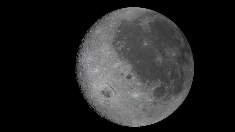 This handout image released by NASA shows a fully illuminated view of the Moon, including the Orientale basin and parts of the far side not visible from Earth, on April 6, 2026. The Artemis astronauts entered the final phase of their run-up to a lunar loop on April 6, a tipping point of sorts that means the Moon's gravity is now having a stronger pull on the spacecraft than Earth's. The Orion capsule will now whip around the Moon, setting the crew up to travel farther from our home planet than any human before. (Photo by Handout / NASA / AFP)