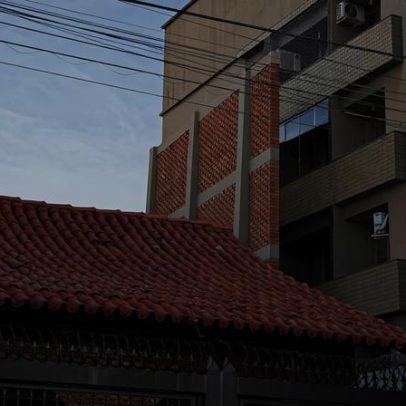 Muro gigante em MG bloqueia visão de prédio vizinho e viraliza nas redes