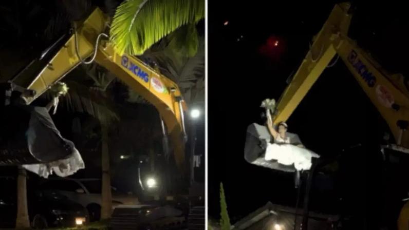 Noiva surpreende e chega 'voando' para casamento dentro de concha de escavadeira em SC