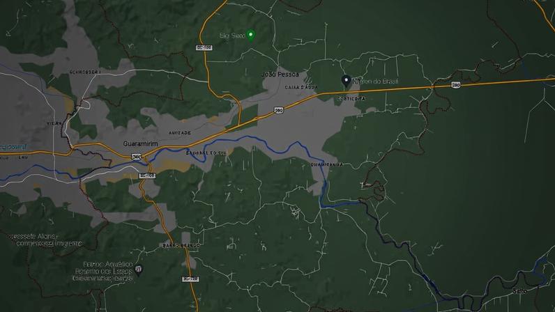 Vista aérea de Guaramirim SC em dia claro, com área urbana e vias principais