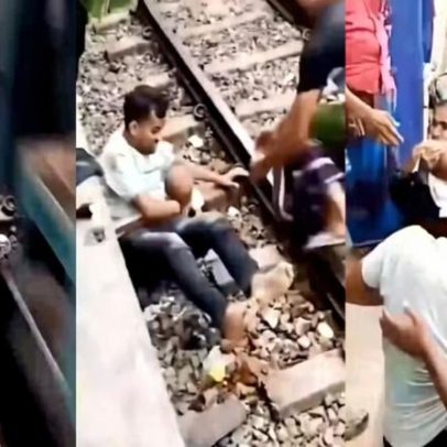 Pai salva filho em trilhos durante passagem de trem em Bangladesh