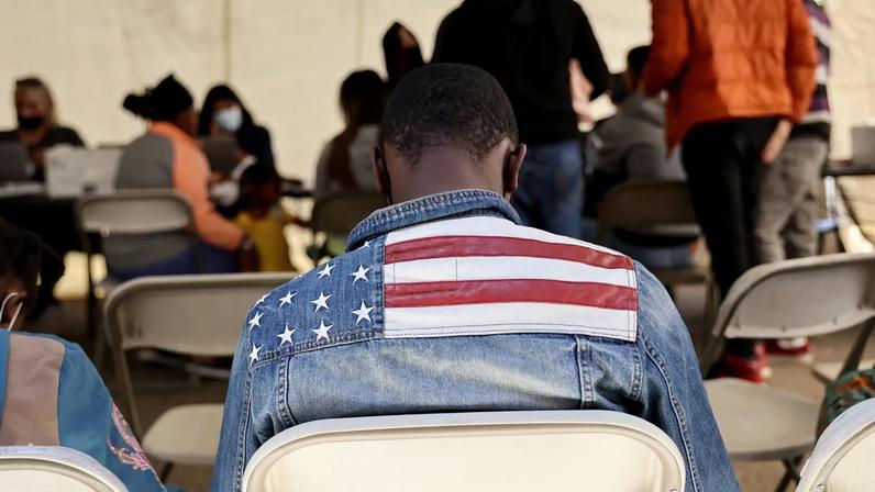 Migrants at an Arizona processing center for asylum seekers in 2023.
