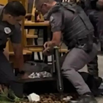 Homem com espada é imobilizado por PMs com arma de choque em Viracopos